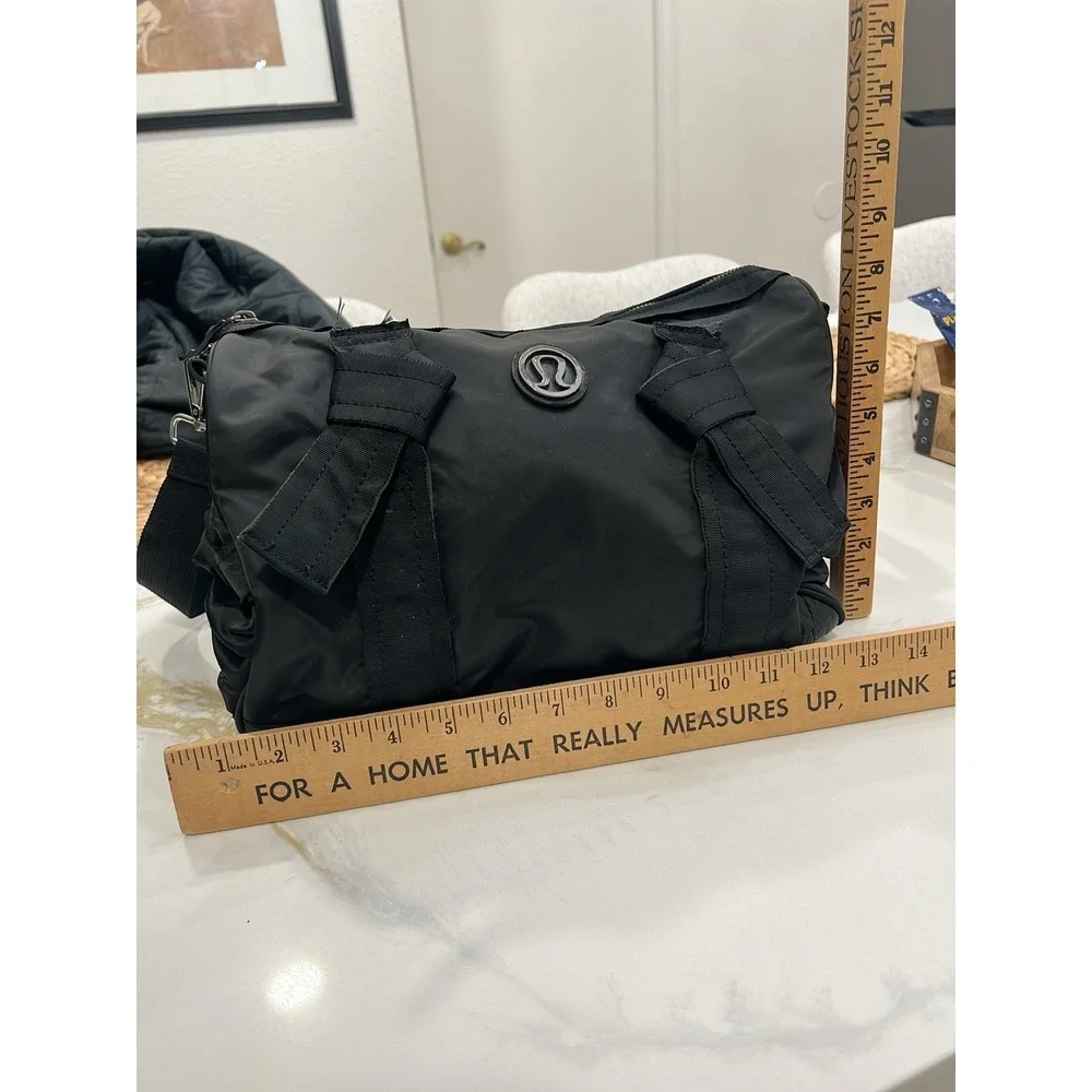Lululemon Black Nylon Duffel Gym Travel Bag Shoulder Strap Logo Tote Bow